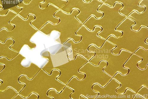 Image of gold puzzle 