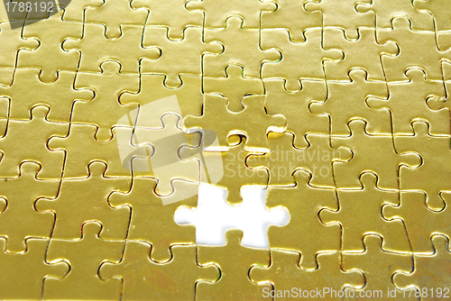 Image of gold puzzle