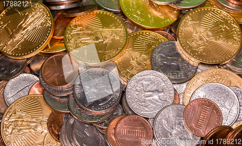 Image of US coins including one ounce pure gold