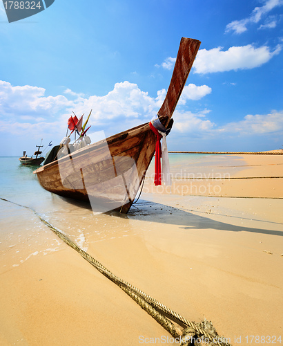 Image of Traditional Thai longtail boat on beach