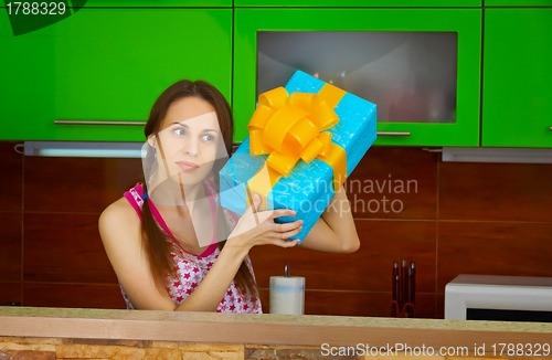 Image of Young woman received a gift