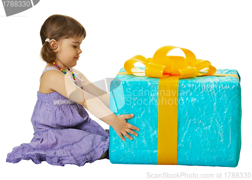 Image of Girl with a big gift box on white background