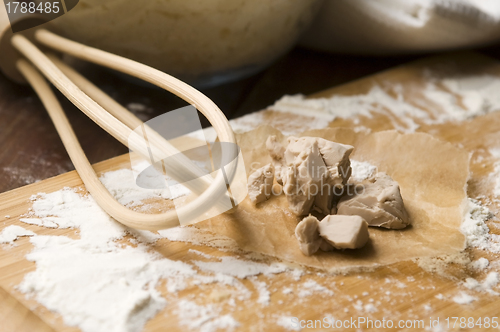 Image of Baker's yeast on wooden board