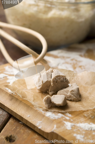 Image of Baker's yeast on wooden board