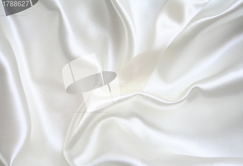 Image of Smooth elegant white silk as background 