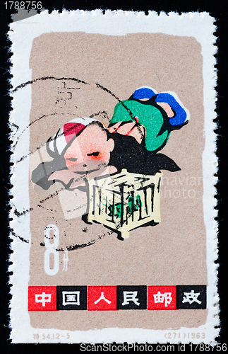 Image of CHINA - CIRCA 1963: A stamp printed in China shows playing boy, 