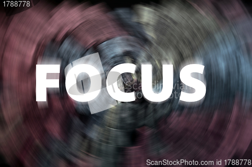 Image of Focus word with motion rays on a chalkboard background 