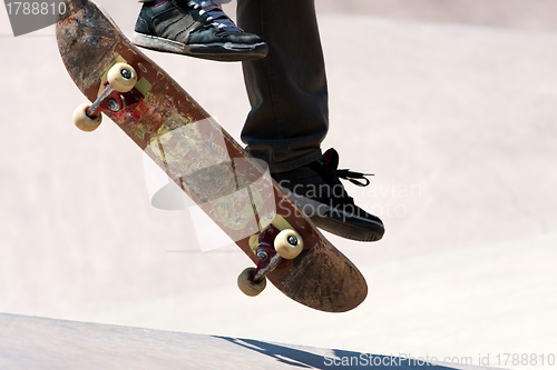 Image of Skateboarder Jumping Tricks