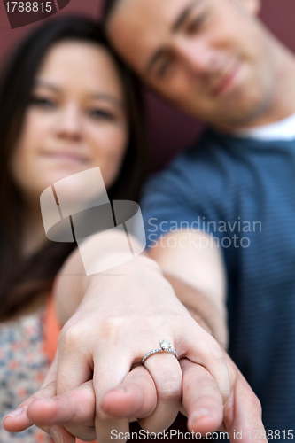 Image of Engaged Couple Shows Diamond Ring