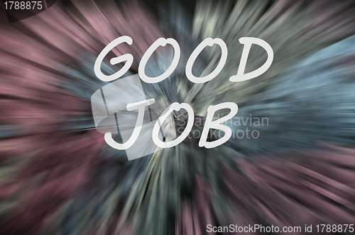 Image of Good job written on a blurred background with motion rays
