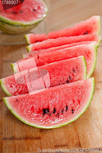 Image of fresh watermelon on a  wood table