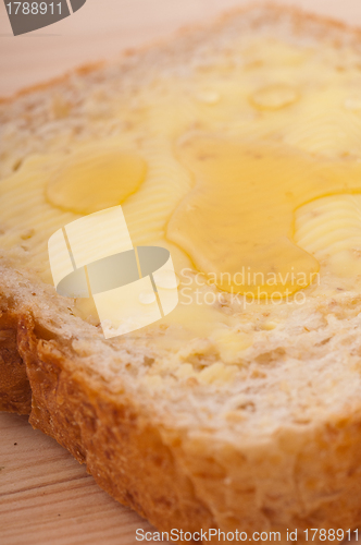 Image of bread butter and honey