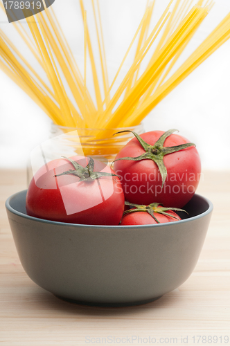 Image of fresh tomato and spaghetti pasta