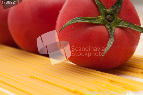 Image of fresh tomato and spaghetti pasta