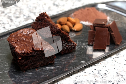 Image of some brownies with their ingredients