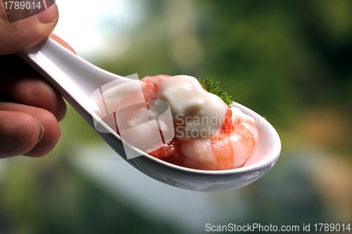 Image of tasty fresh shrimps on a spoon