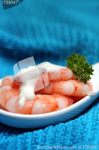 Image of tasty fresh shrimps on a spoon