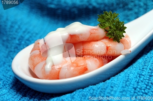 Image of tasty fresh shrimps on a spoon