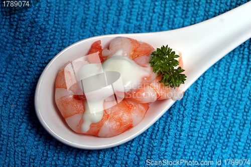 Image of tasty fresh shrimps on a spoon