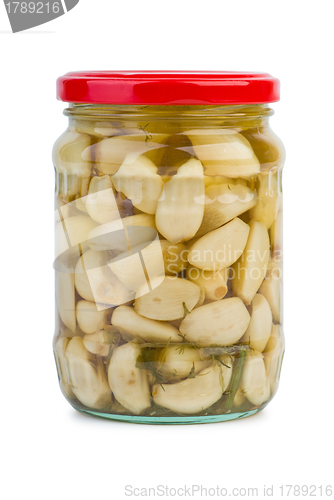 Image of Glass jar with marinated garlic