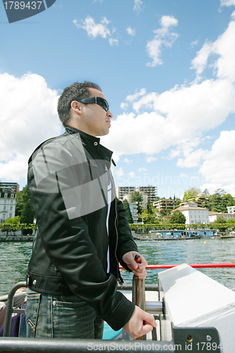 Image of Man boating in Lugano Lake