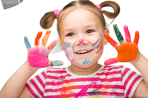 Image of Portrait of a cute girl with painted hands