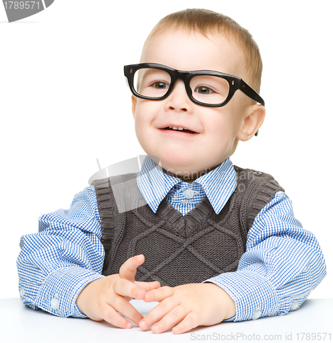 Image of Portrait of a cute little boy wearing glasses