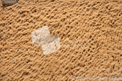 Image of Old wall with embossed plaster