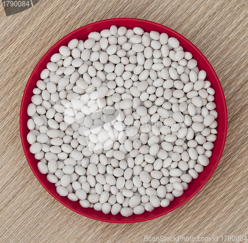 Image of White beans in a red bowl
