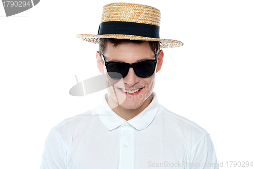 Image of Closeup shot of smiling young man in hat