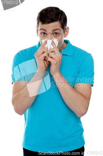 Image of Young guy suffering from cold