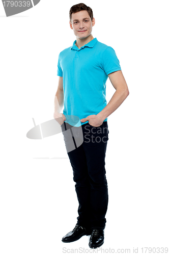 Image of Full length portrait of casual young man