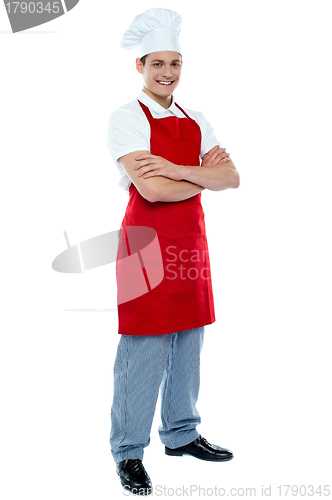 Image of Full length shot of handsome smiling chef