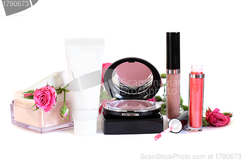 Image of Cosmetics - makeup powder, cream, blush, lip gloss and flowers o