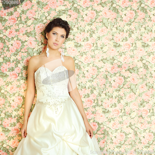 Image of Beautiful woman on floral summer background