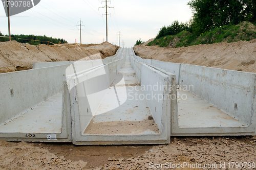 Image of Concrete moats. electrical and communications lay 