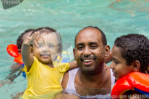 Image of Family fun at the pool