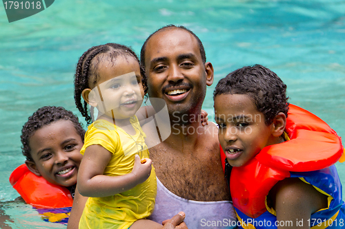 Image of Family fun at the pool