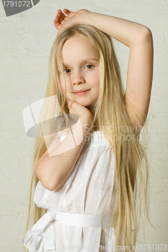 Image of Smiling blonde girl with long hair