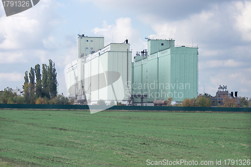Image of Grain elevator rises among the fields