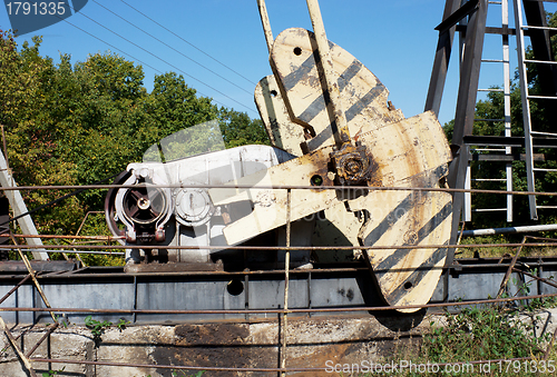 Image of The counterweight  oil machine- rocking chair