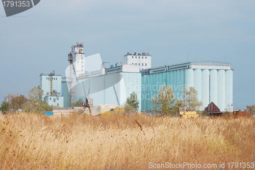 Image of Grain elevator rises among the steppe