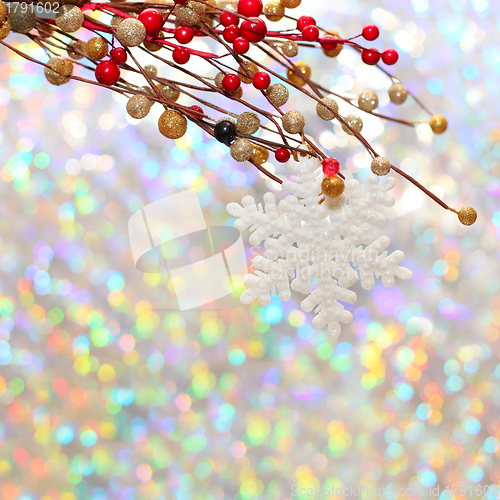 Image of Christmas snowflake and decoration on silver background