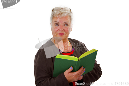 Image of Female senior reading a book