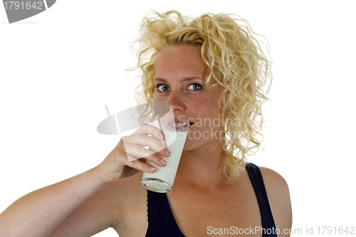 Image of Young woman drinking fresh milk