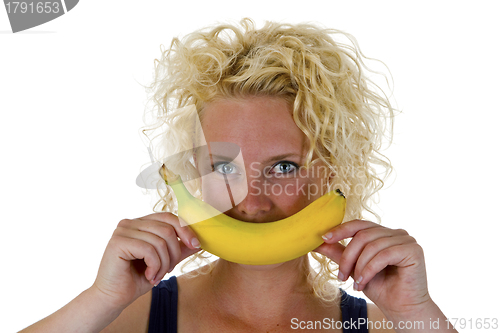 Image of Beautiful young woman with banana
