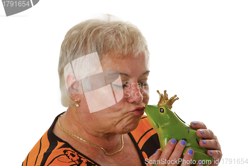 Image of Senior female with a toy frog prince