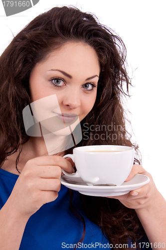 Image of beautiful young woman with cup of coffee 