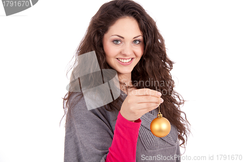 Image of beautiful brunette smiling woman with christmas decoration