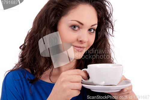 Image of beautiful young woman with cup of coffee 